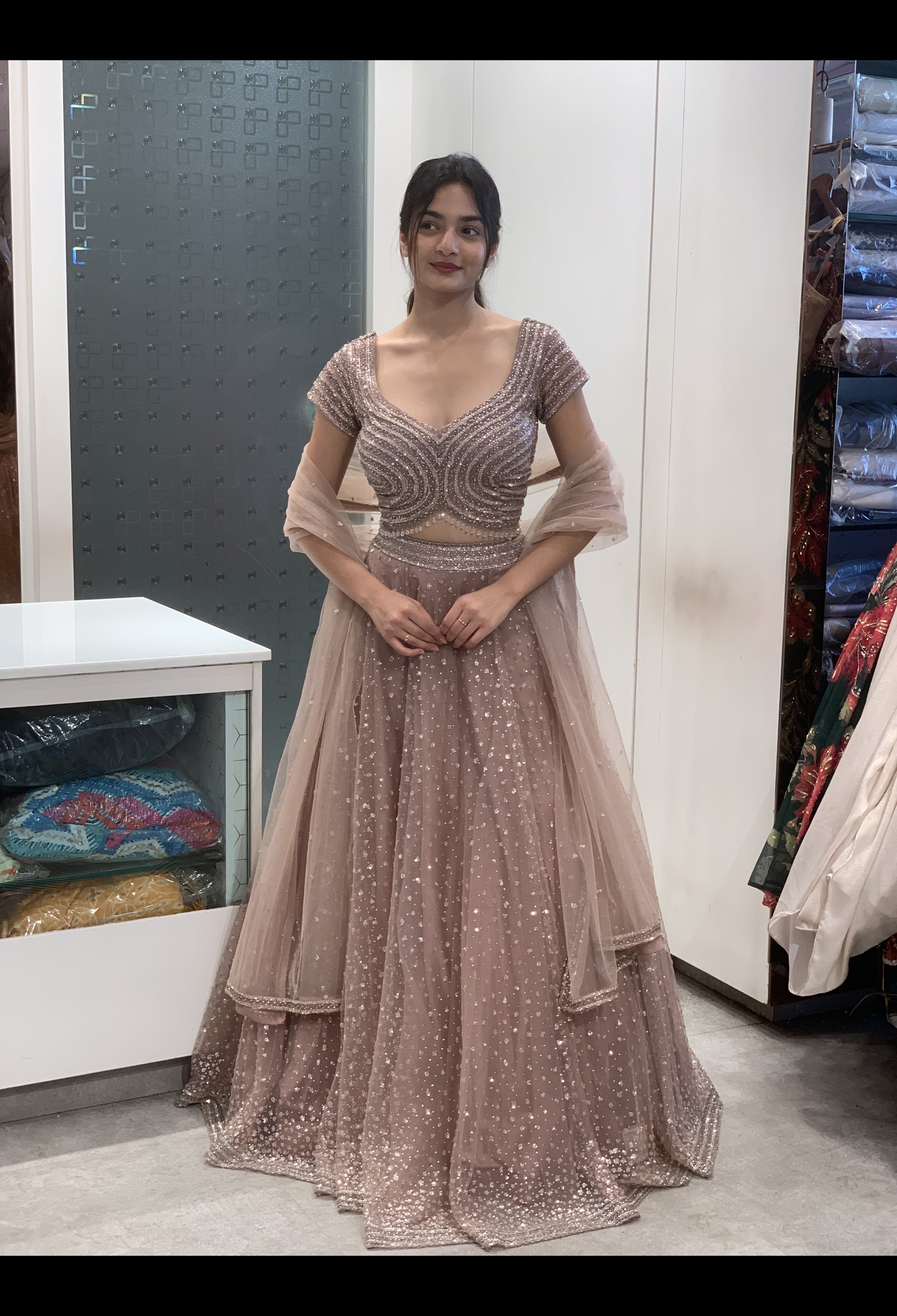 Blush Pink Net All-Over Stone & Sequin Embellished Blouse & Lehenga
