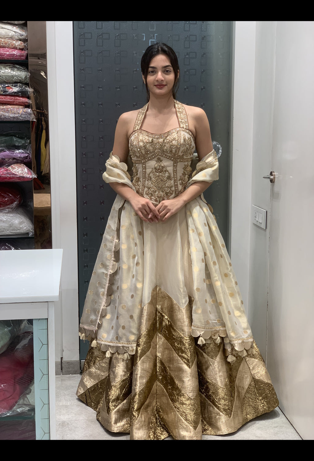 Cream Tissue Golden Patch Work Halter Neck Top & Lehenga