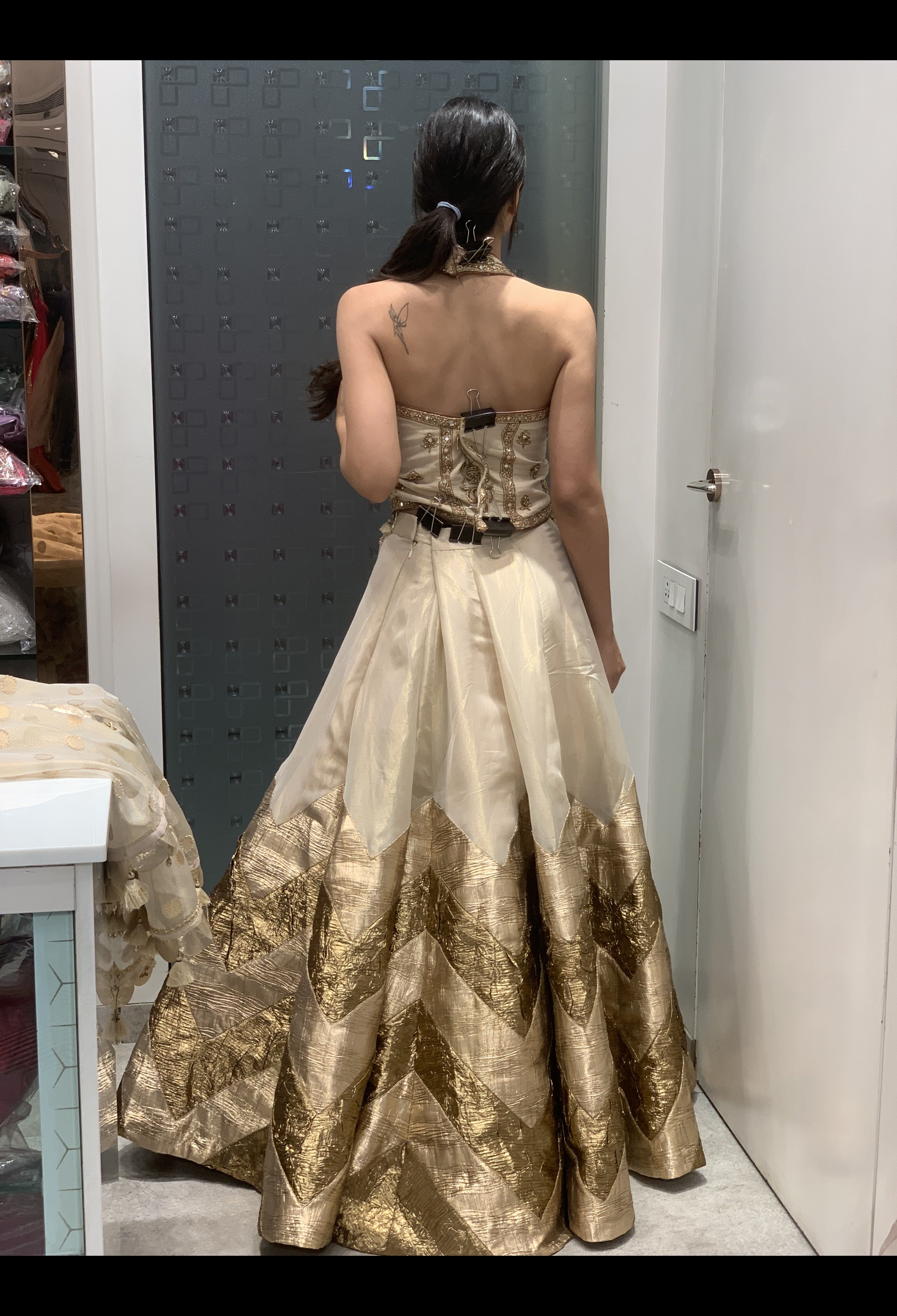 Cream Tissue Golden Patch Work Halter Neck Top & Lehenga