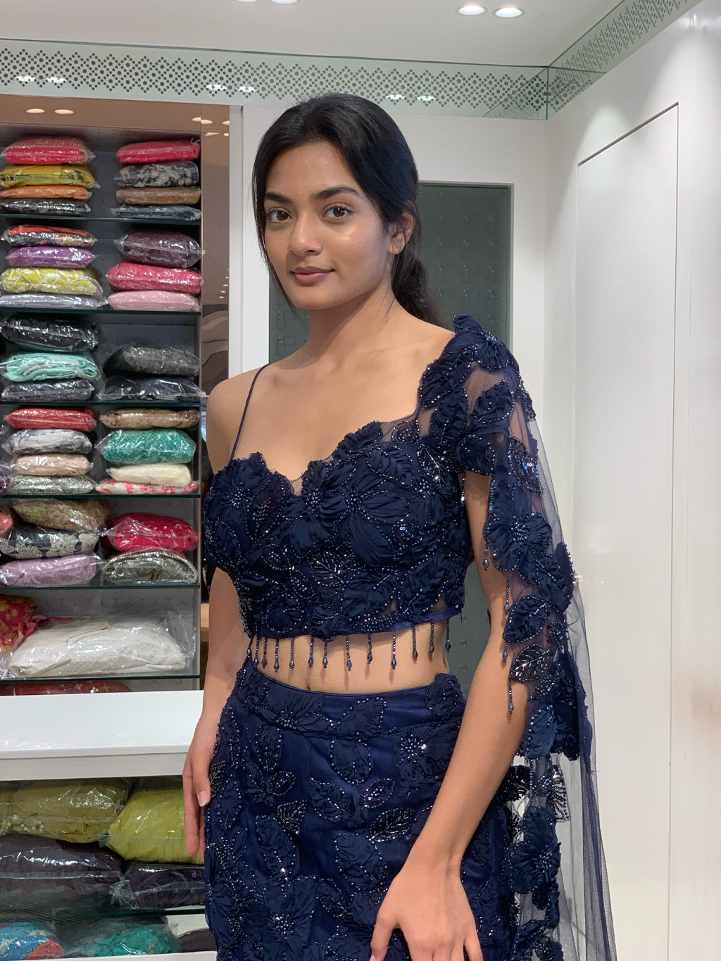 Blue Net Applique & Cutwork One Shoulder Falling Sleeve Top & Fish Cut Lehenga