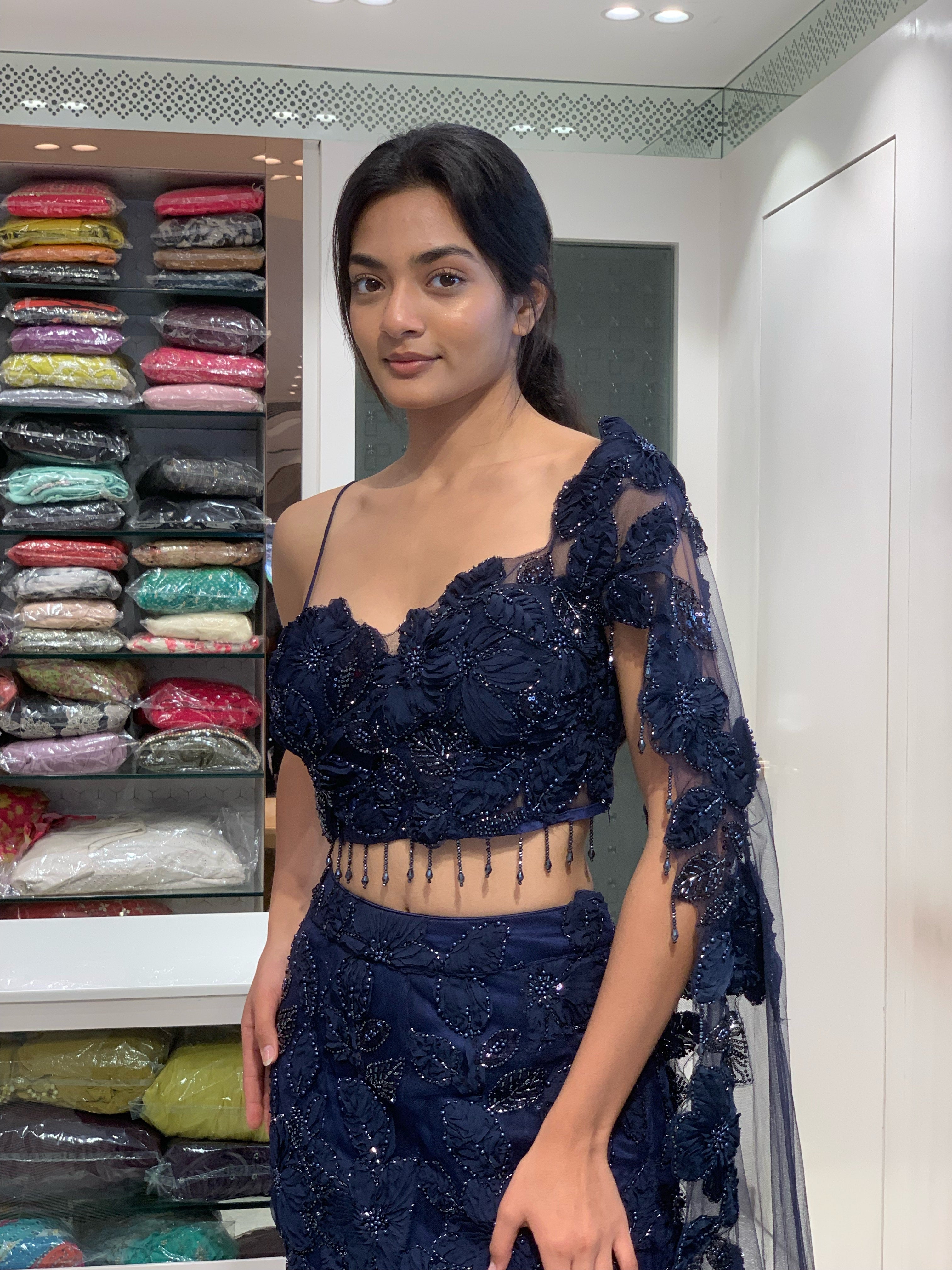 Blue Net Applique & Cutwork One Shoulder Falling Sleeve Top & Fish Cut Lehenga