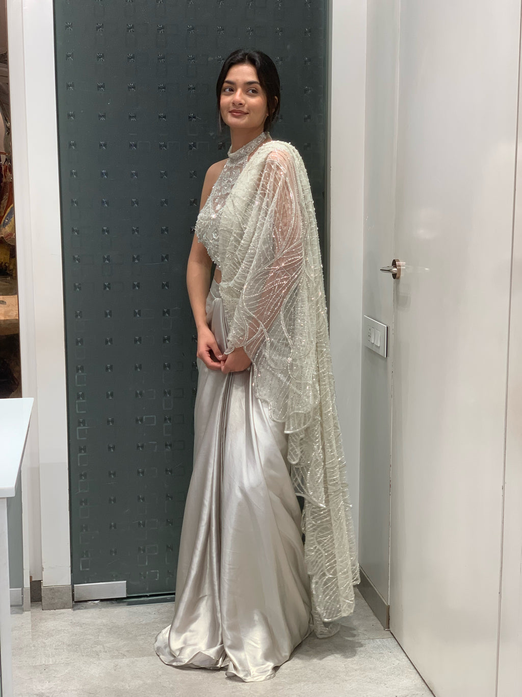 White Net Halter Neck Blouse & Drape Saree